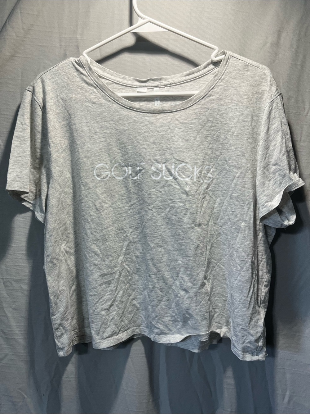 Travis Mathew Women's Light Gray 'GOLF SUCKS' Crewneck Tee